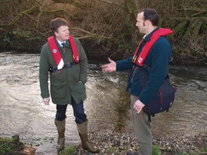 Richard Benyon and EA Fisheries officer Dominic Martyn